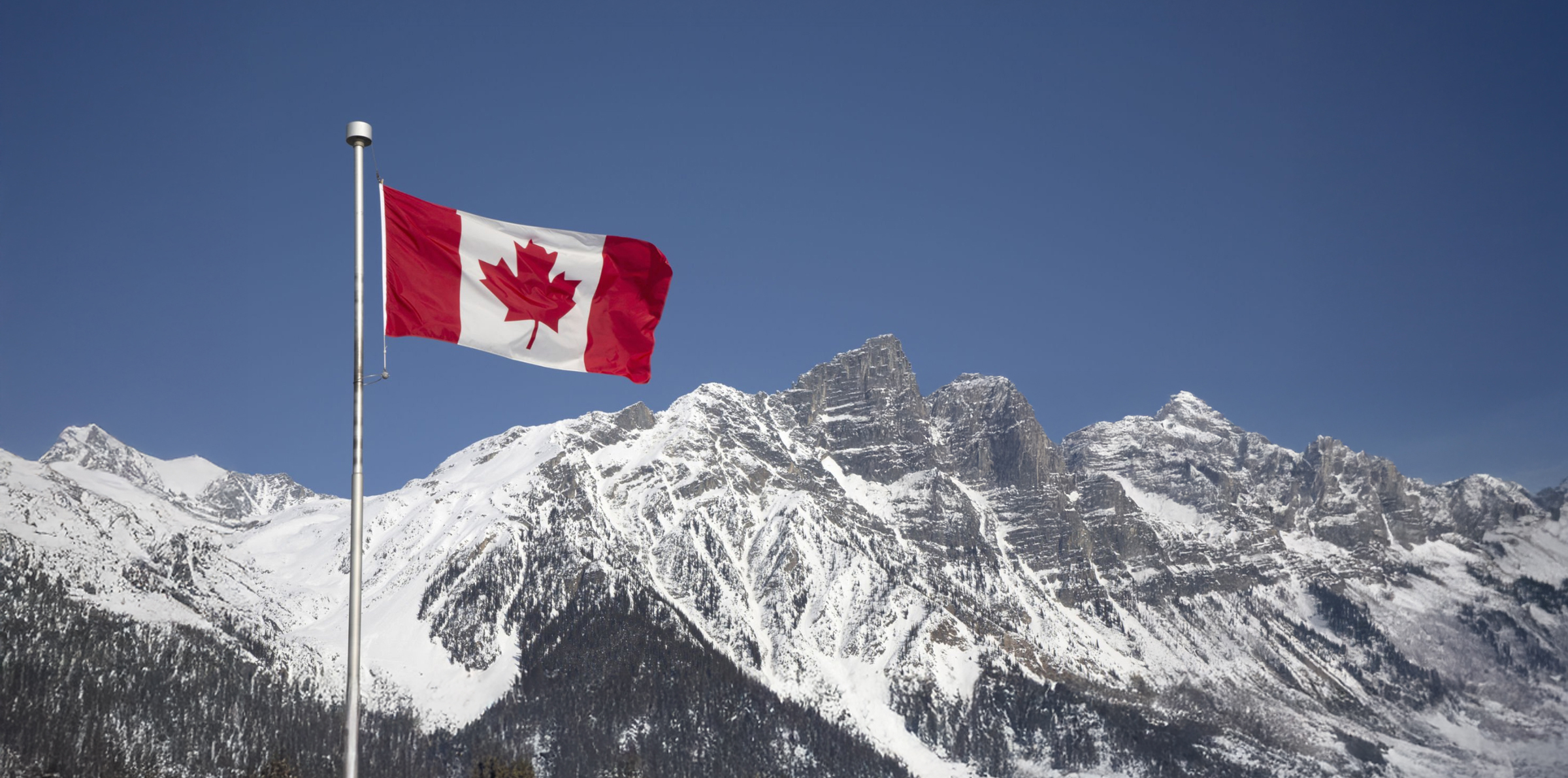 Canadian flag and mountain landscape from the original Enable Benefits website